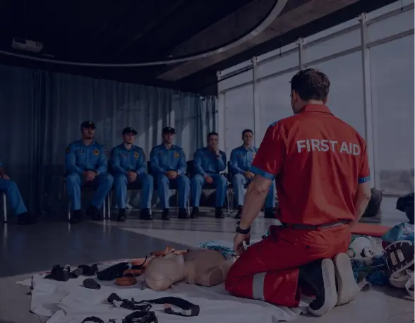 First aid instructor training security guards in CPR and emergency response techniques – American Security Force