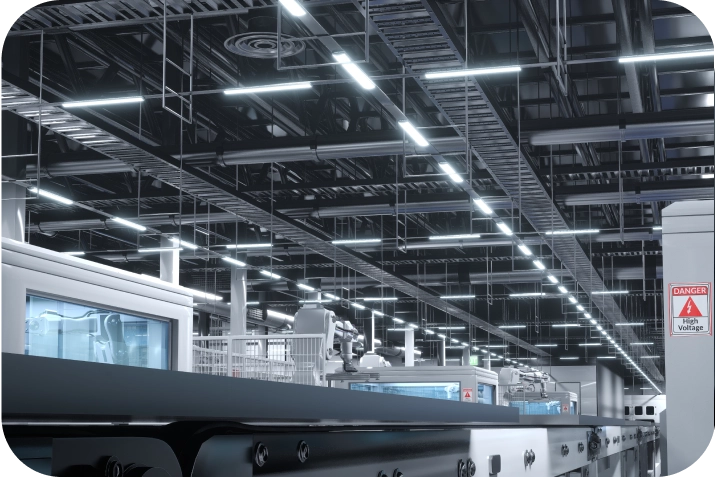 High-tech industrial facility with automated machinery and bright overhead lighting, highlighting the need for advanced industrial security systems by American Security Force.