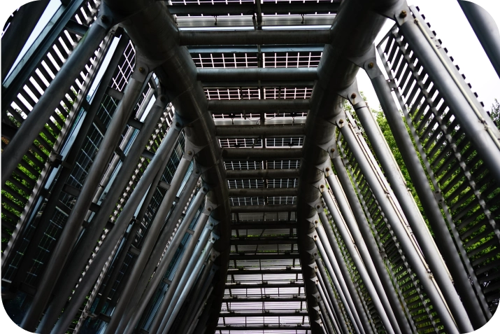 Reinforced steel structure forming a secure passageway or industrial enclosure, symbolizing critical infrastructure security solutions by American Security Force.