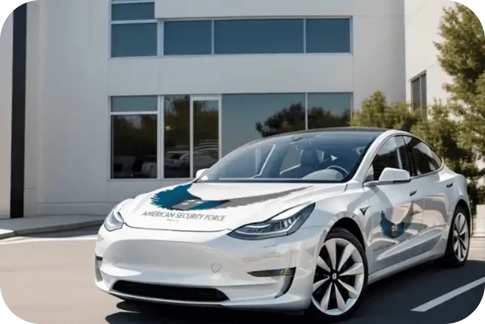 American Security Force branded vehicle parked outside an office building