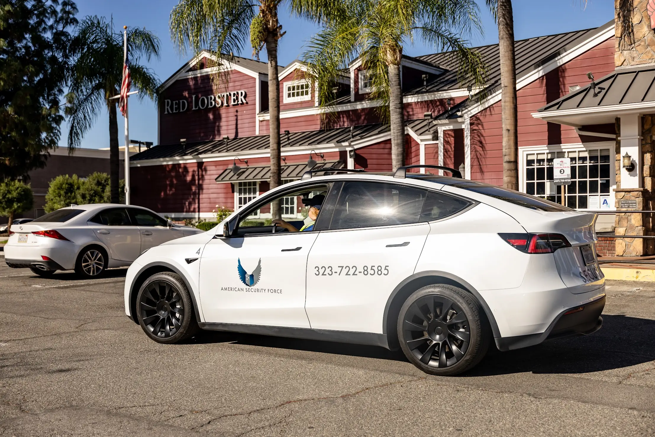 American Security Force mobile patrol vehicle providing restaurant security outside a Red Lobster location in Southern California
