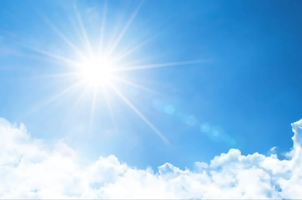 Bright sun in a blue sky representing solar-powered security solutions from American Security Force